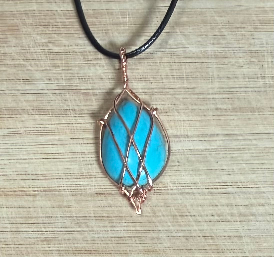 Copper wrapped turquoise stone pendant