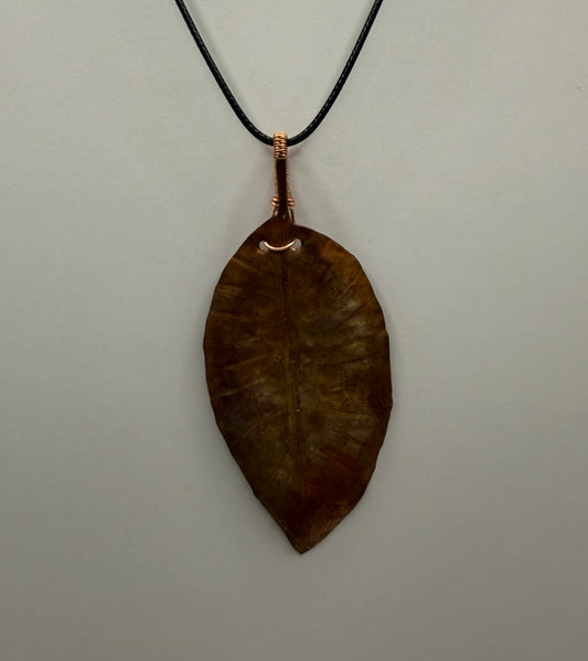 Hand hammered and formed copper leaf pendant