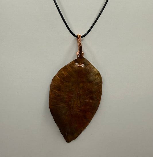 Hand hammered and formed copper leaf pendant