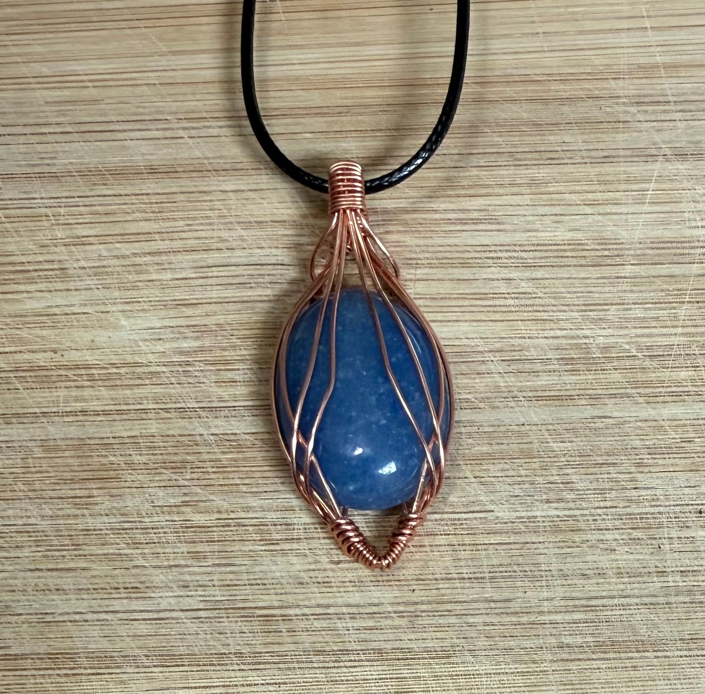Copper wrapped aquamarine stone pendant